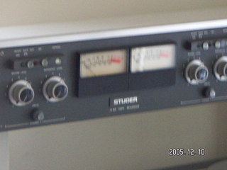 reel-to-reel tapes on shelves