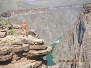 Plateau Point -- Mighty Colorado River -- Adam on rock ledge