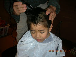 Gaby getting a haircut