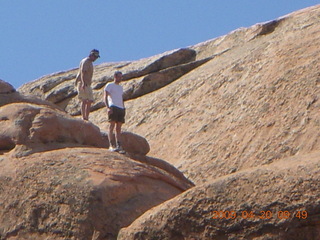 Arches National Park - Devil's Garden hike - two fellows atop Double-O Arch