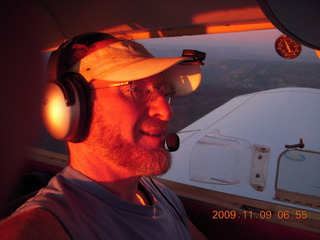 7 719. Adam flying N4372J at dawn