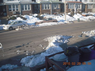 chairs in snow-shoveled parking spaces in Philadelphia