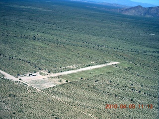 aerial - Coolidge (P08) with airplane off runway
