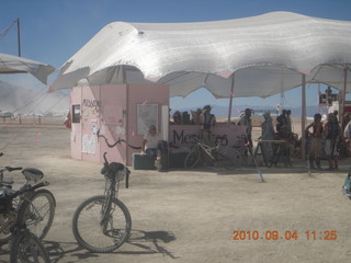 7S5 to DVT trip - Nevada - Black Rock City - Burning Man entrance - woman with face protected