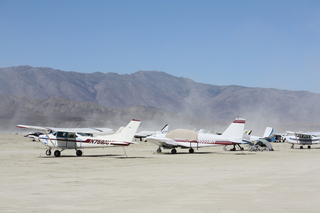 7S5 to DVT trip - Nevada - Black Rock City - Burning Man - woman with face protected