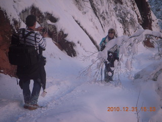 74 7ex. Zion National Park trip - Hidden Canyon hike - Luiz taking a picture of Sheri