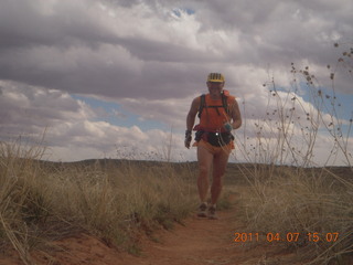 26 7j7. Canyonlands Lathrop hike/run - Adam running (tripod)