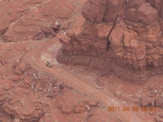 Anticline Overlook - someone driving on dirt road below