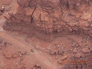 Anticline Overlook - someone driving on dirt road below
