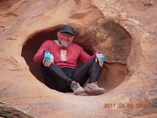 1446 7j9. Arches Devil's Garden hike - Adam in hole in rock