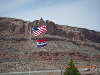 whipping flags in the wind at Archview (Shell station)