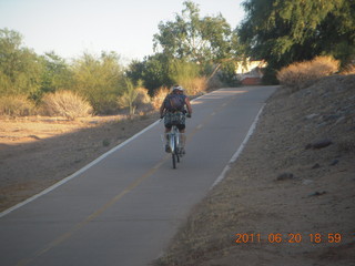 Adam riding newly-restored Schwinn Typhoon bike ('the beast')