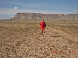 75 7qa. Sand Wash airstrip - Adam running (tripod)