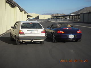 my Volkswagon Golf and Antoine's Porsche