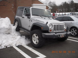Jeep high on a snowbank in Philadelphia