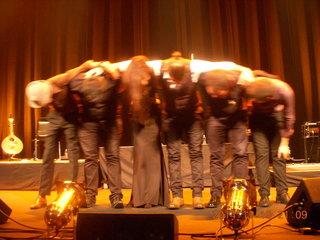 Ana Moura and her musicians bowing