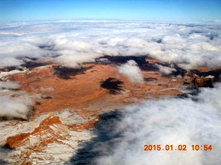 10 8v2. aerial - clouds over the snowy desert