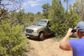 drive to Calamity Mine - difficult side road - Adam taking picture of the truck