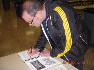 Curtis Arboretum - Cheltenham XC alumni race - Eric L signing book