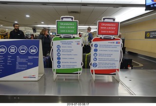 57 a0f. Chile - Santiago Airport - signs