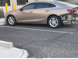 Anthony's damaged car with new tires