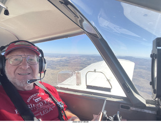 Adam flying N8377W