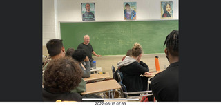 Adam teaching math class at Cheltenham High School