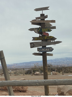 123 a1n. gas station on the way to moab - signs to various places